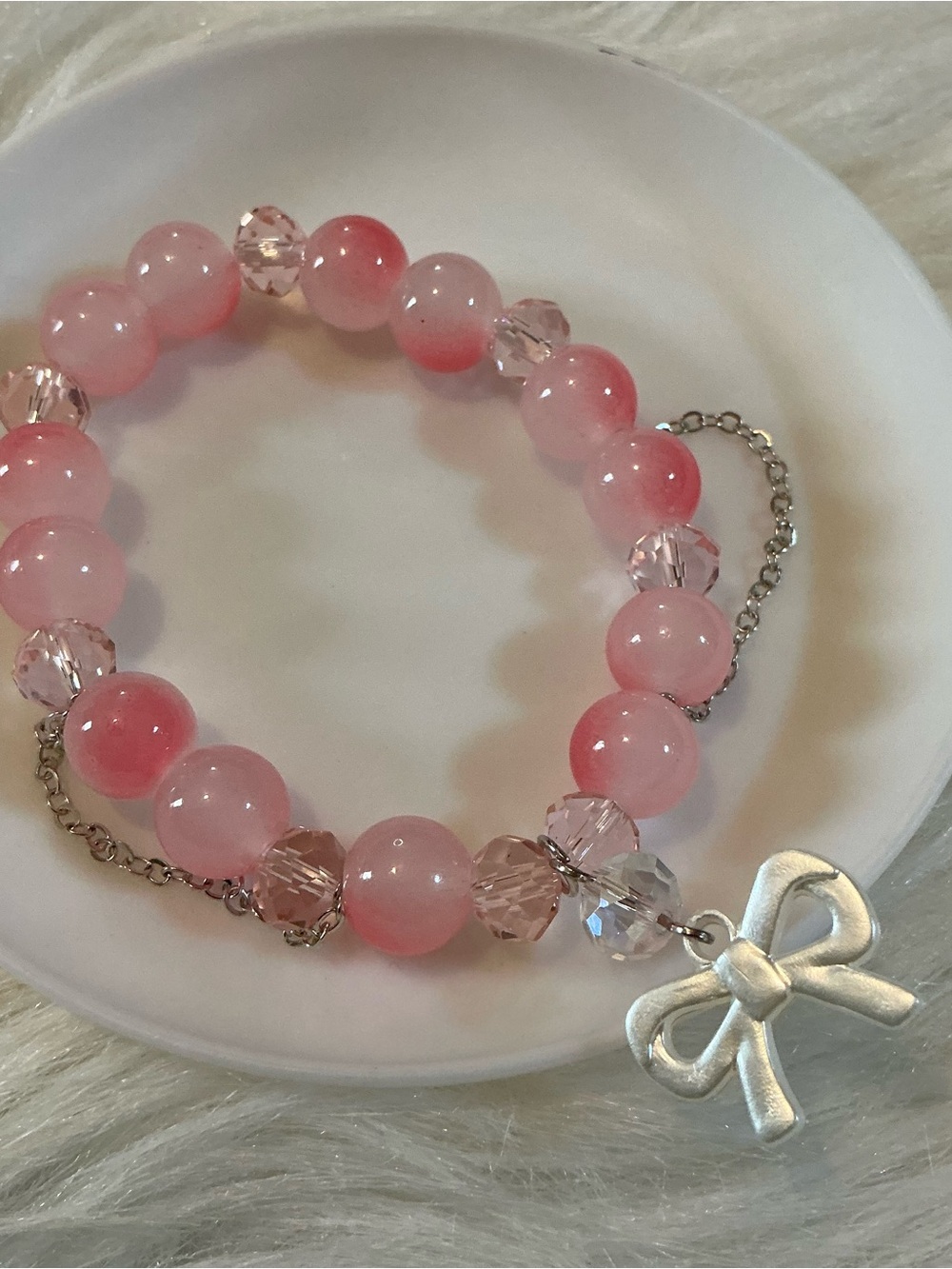 Pink/silver-tone ribbon bow charm bead bracelet